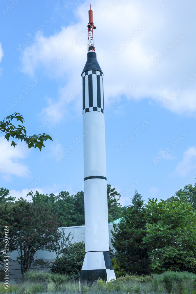 Obraz premium Space rocket isolated on blue background