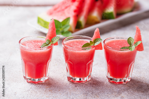 Glasses of watermelon smoothie with mint