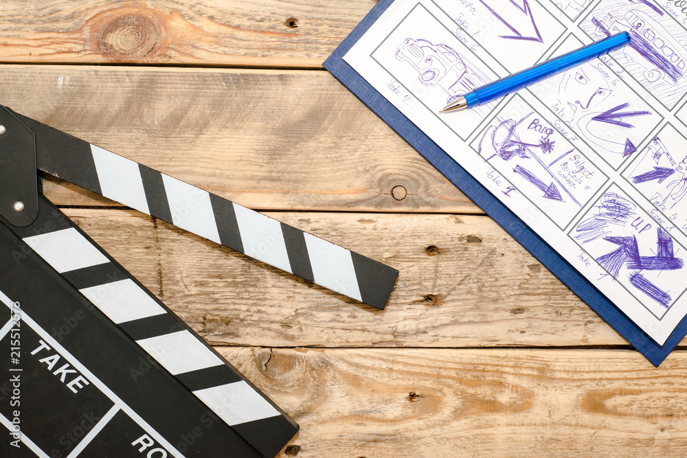 Fototapeta premium clapperboard, storyboard on wood