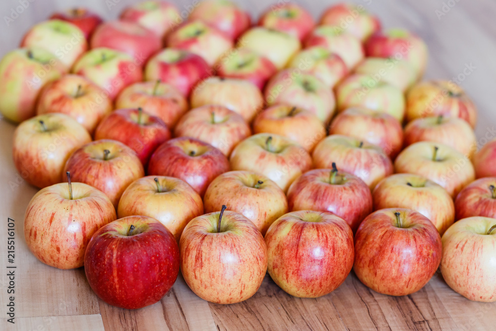 beautiful apples lie on a wooden background beautiful apples lie on a wooden background