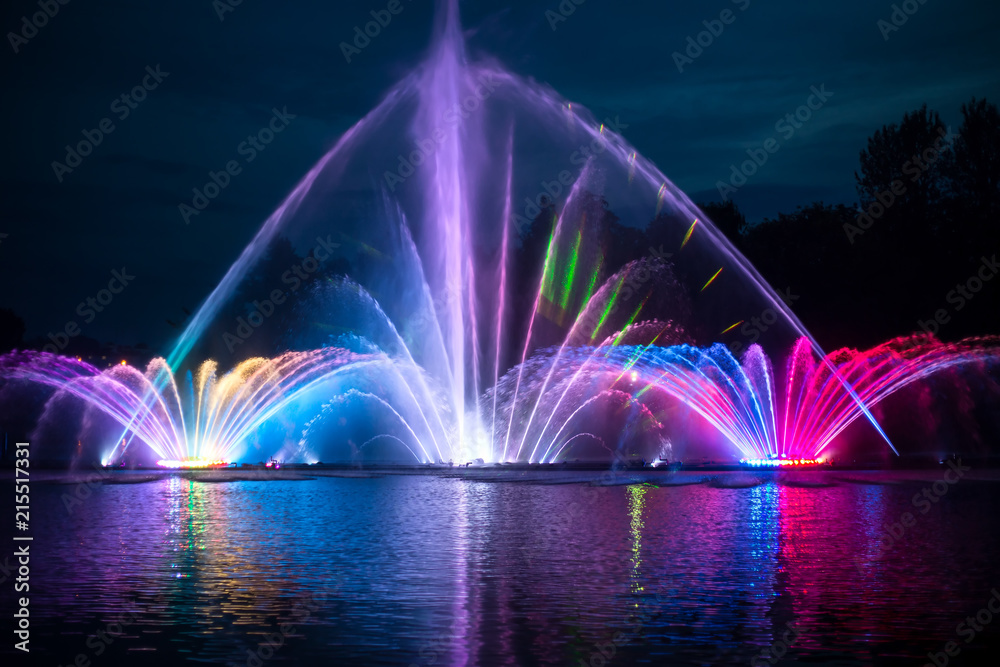 Musical fountain with colorful illuminations in night Musical fountain with colorful illuminations in night