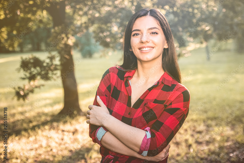 Young female farmer with arms crossed in the field Young female farmer with arms crossed in the field
