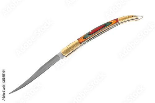 Old elegant long penknife with thin blade and multicolor wooden handle. Isolated on white