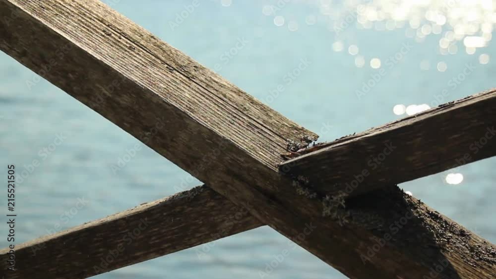 Wooden bridge construction on a sunny summer day Wooden bridge construction on a sunny summer day