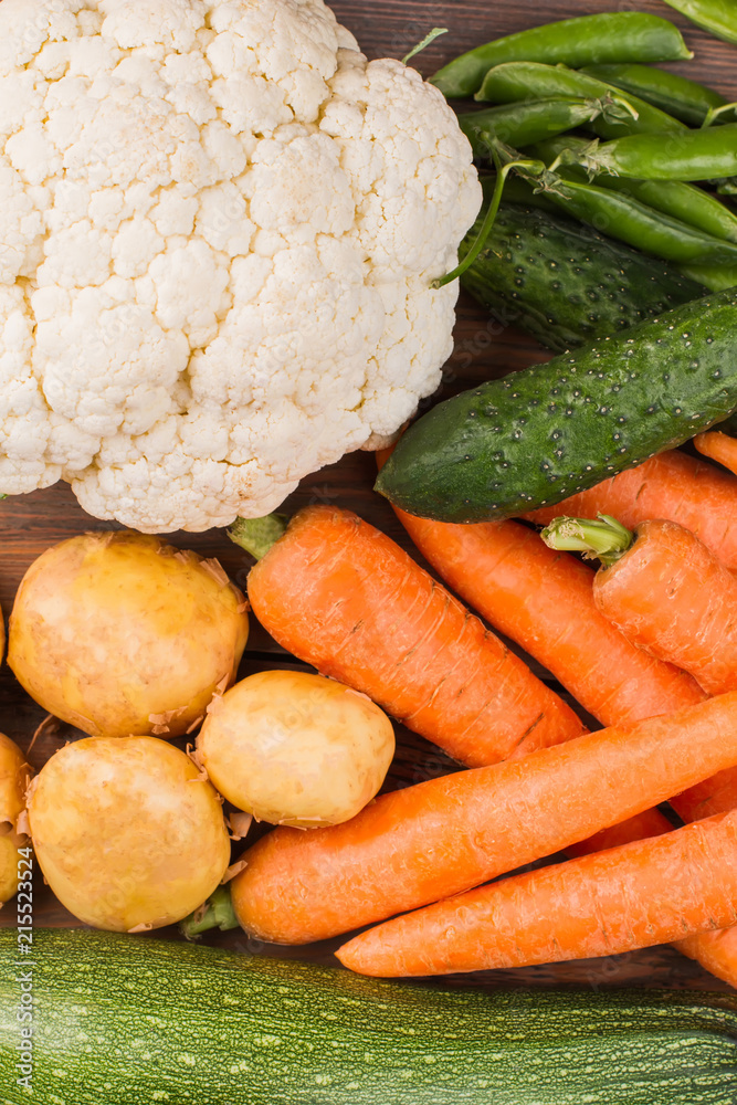 Fresh raw organic vegetables. Set of fresh vegetables on wood, close up. Fresh raw organic vegetables. Set of fresh vegetables on wood, close up.