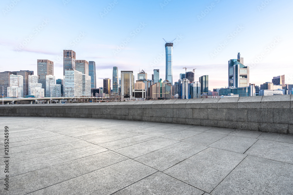 empty square with ctiy skyline