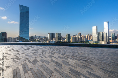 empty square with ctiy skyline photo