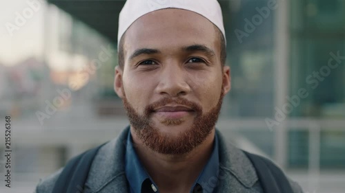 portrait of young muslim business owner business man standing in city photo