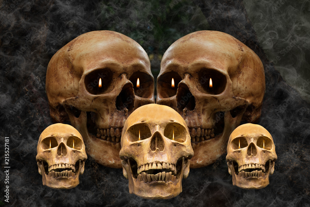 The skulls has a flaming eye in the smoke.Still life style and art visual with selective focus.