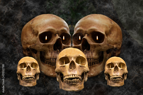 The skulls has a flaming eye in the smoke.Still life style and art visual with selective focus.