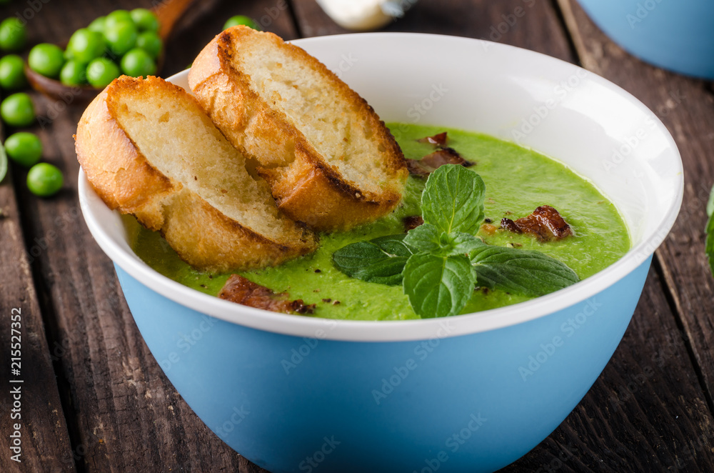 Pea soup, fresh herbs and bacon