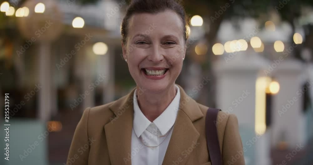 portrait happy middle aged business woman smiling cheerful enjoying professional urban lifestyle successful caucasian female executive wearing stylish fashion in city evening portrait happy middle aged business woman smiling cheerful enjoying professional urban lifestyle successful caucasian female executive wearing stylish fashion in city evening