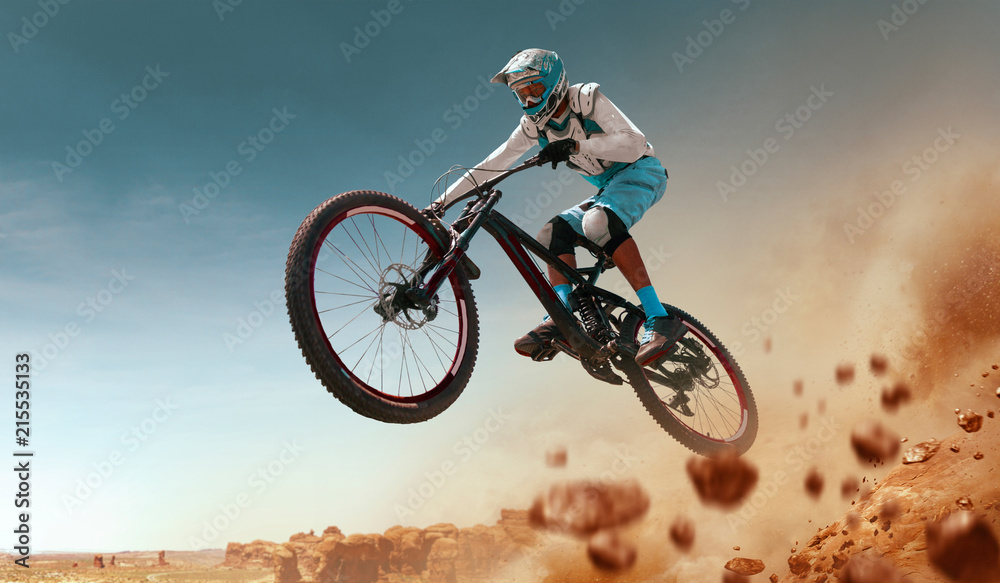 Cyclist riding a bicycle. Downhill. Cyclist riding a bicycle. Downhill.