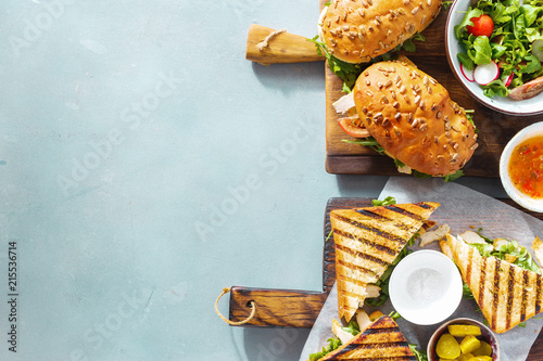 Grilled sandwich nuggets, salad copy space top view Various snacks Outdoor food