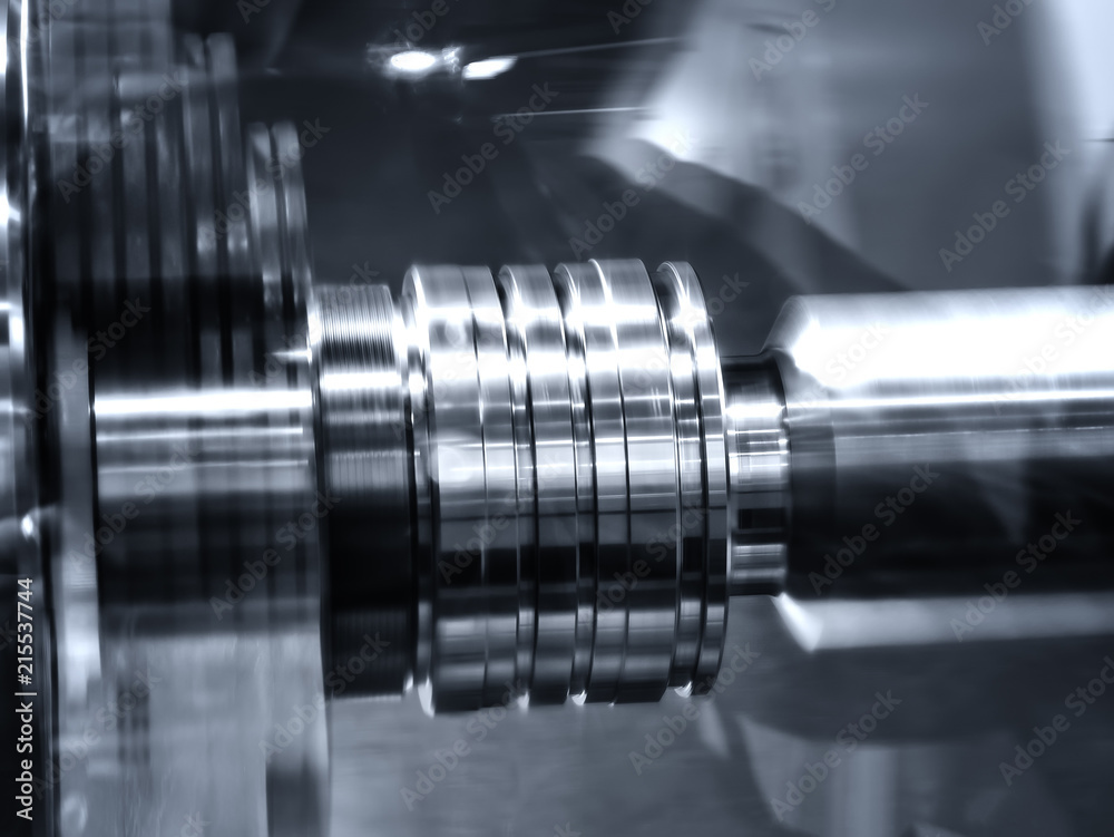 CNC lathe machine (Turning machine) cutting metal screw thread part .Hi-precision CNC machining concept. CNC lathe machine (Turning machine) cutting metal screw thread part .Hi-precision CNC machining concept.