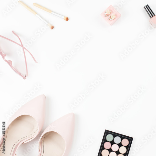 Female fashion accessories and cosmetics in pink color, flat lay.