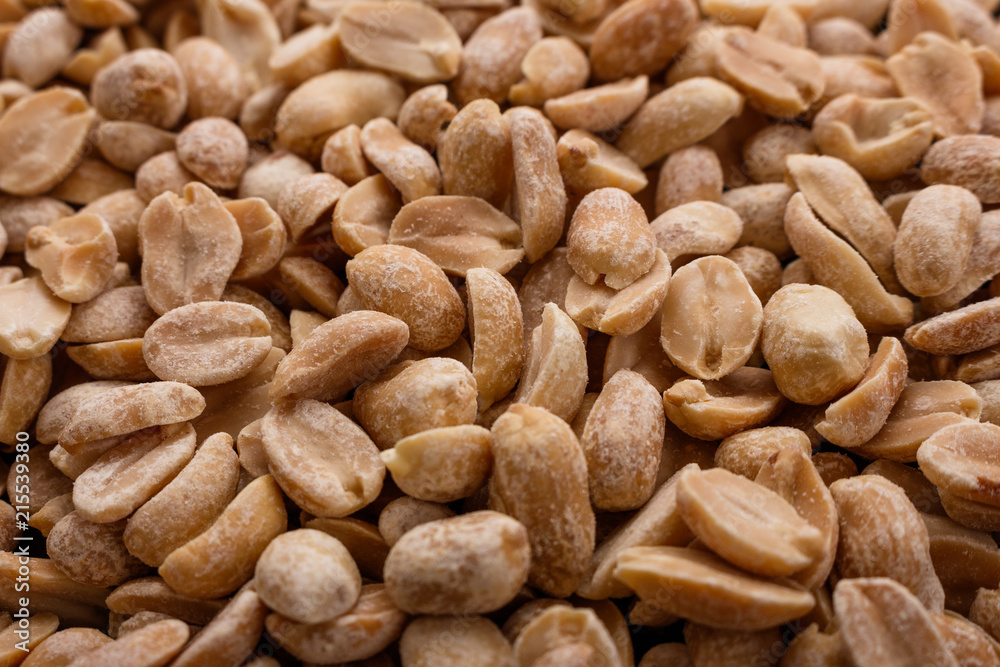 fresh peanuts on a wooden rustic background fresh peanuts on a wooden rustic background