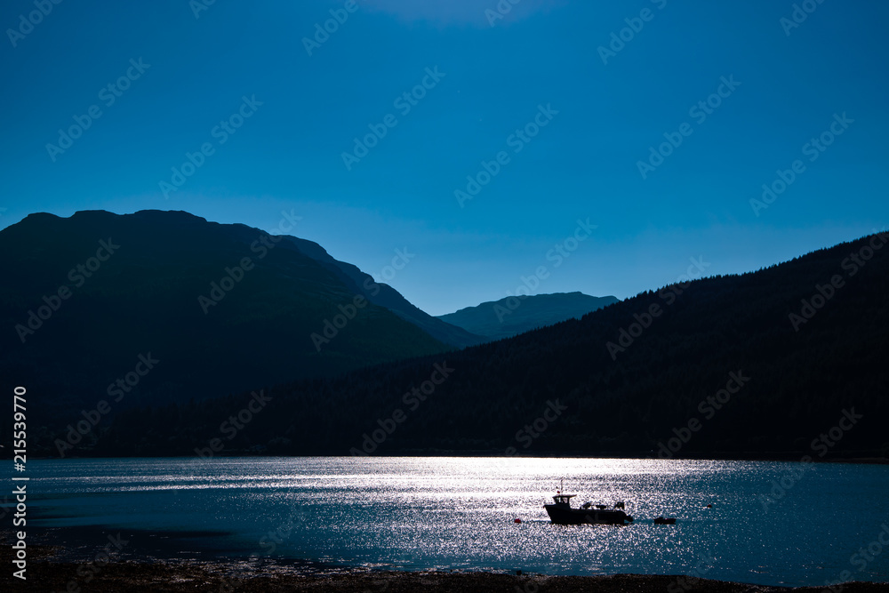 Loch Long at sunset. Arrochar village, Argyll and Bute, Scotland, UK.