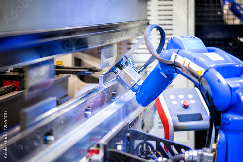 Hand robot working automatic cutting and bending metal sheet by high precision metal sheet bending machine, cnc control metal sheet bending machine in factory