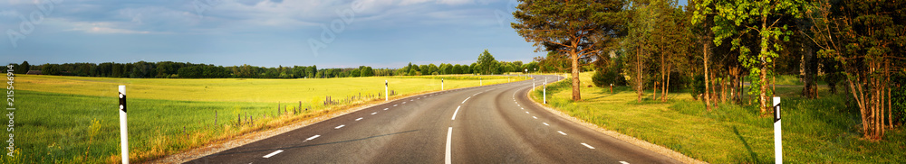 asphalt road view in countryside at beautiful sunset asphalt road view in countryside at beautiful sunset