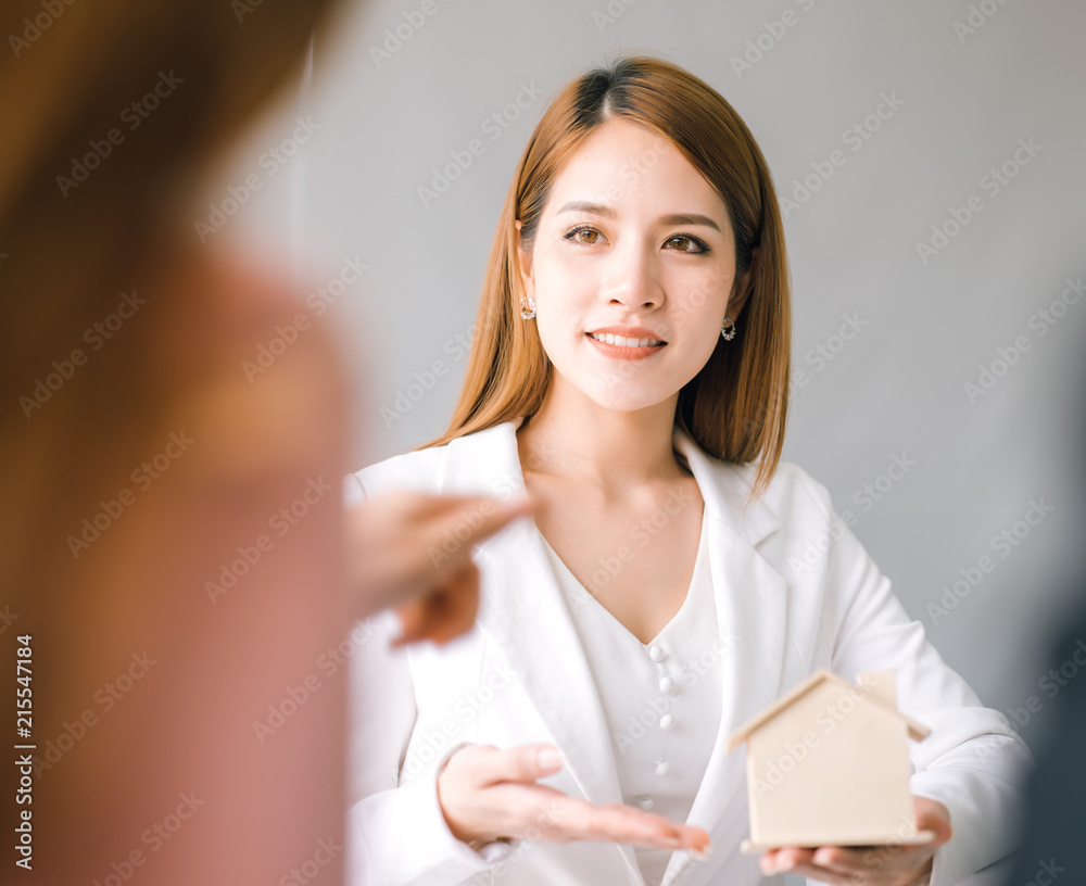 Home sale representative present good house and customer calculate about mortgage loan financial for make decision sell house, insurance agent analyzing about home investment loan Real Estate concept. Home sale representative present good house and customer calculate about mortgage loan financial for make decision sell house, insurance agent analyzing about home investment loan Real Estate concept.