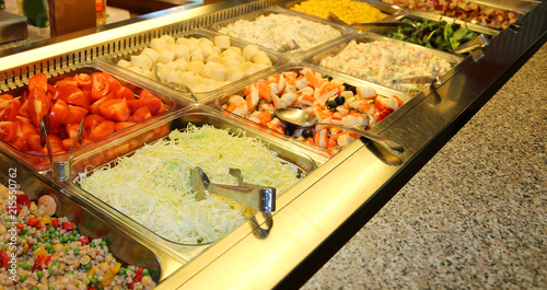 trays with vegetables in a self-service restaurant