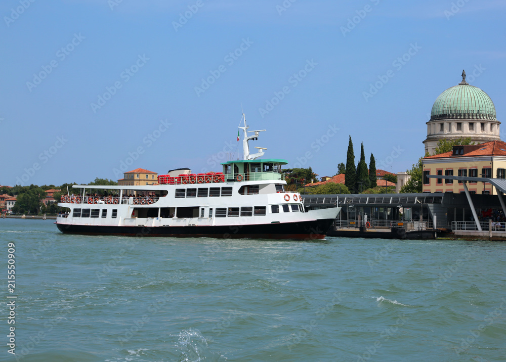 Venice water bus loads tourists on the Lido quay