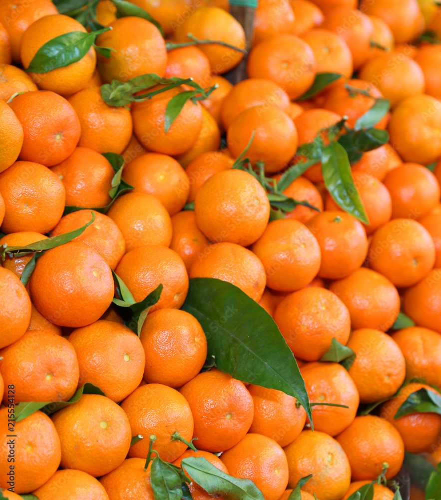 background of orange Sicilian clementines