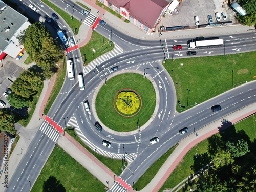 Roundabout intersection in three directions with island, aerial view