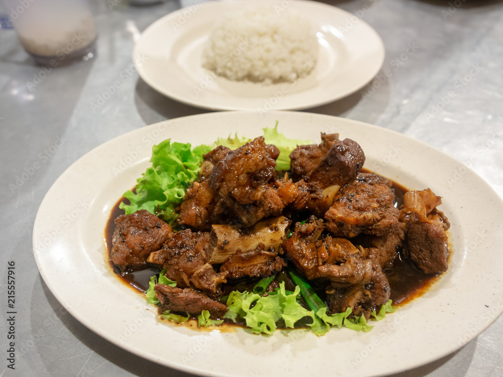Pork in soy sauce in chinese restaurant in Georgetown, Penang Malaysia Pork in soy sauce in chinese restaurant in Georgetown, Penang Malaysia
