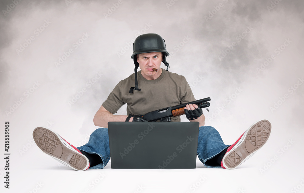 Serious man in military helmet and cigar with shotgun in front of