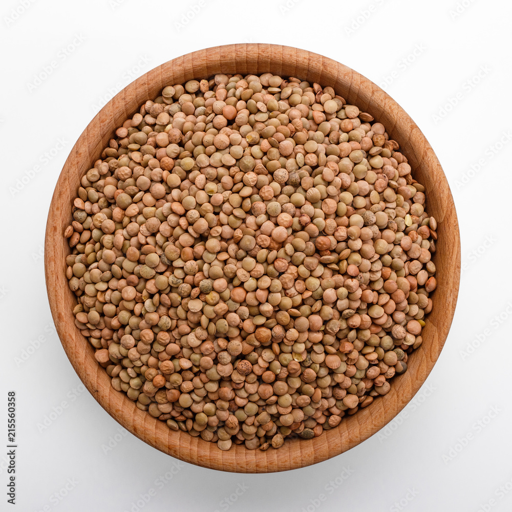 raw lentils on a white acrylic background raw lentils on a white acrylic background