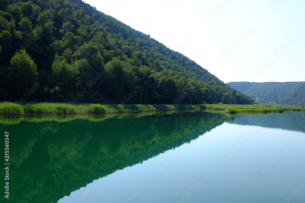 Beautiful reflection on Krka river water at Skradin, Croatia