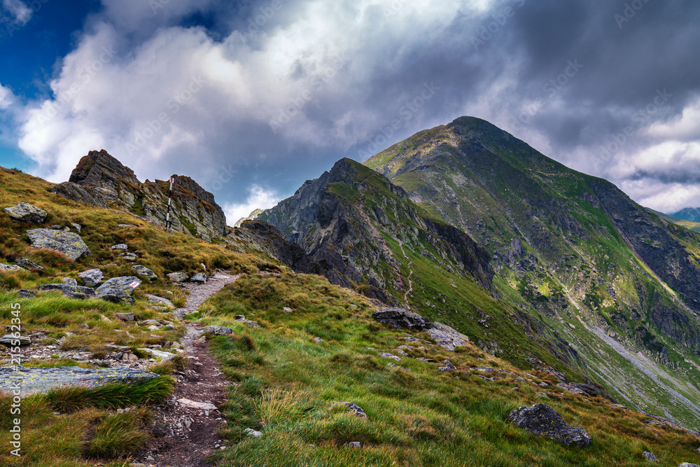 Misty mountains and hiking trail Misty mountains and hiking trail