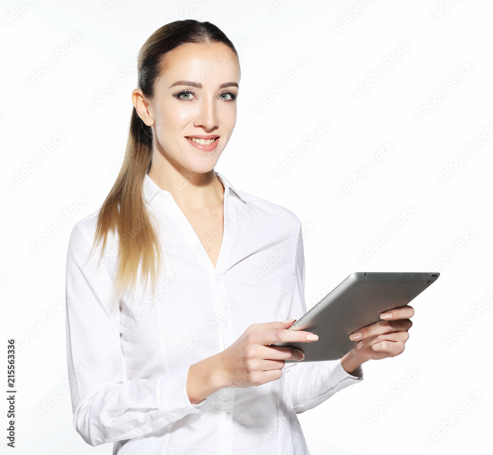 Woman holding tablet computer isolated on white background. working on touching screen. Casual smiling caucasian woman. Woman holding tablet computer isolated on white background. working on touching screen. Casual smiling caucasian woman.