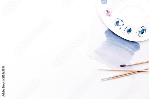 Creative flat lay art workspace