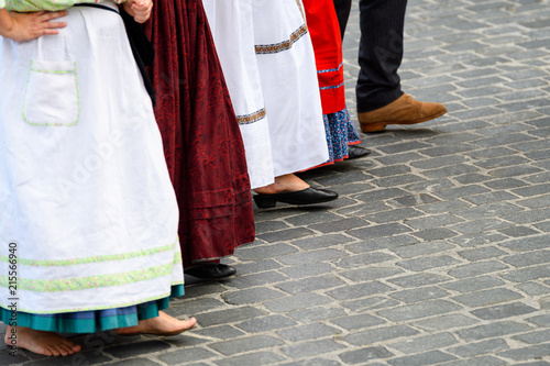 people weared with traditional Portuguese costumes at romeria photo