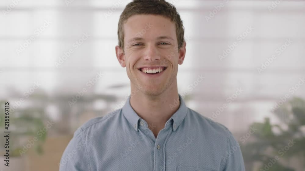 portrait of attractive young businessman smiling cheerful enjoying successful startup business happy caucasian entrepreneur office background portrait of attractive young businessman smiling cheerful enjoying successful startup business happy caucasian entrepreneur office background