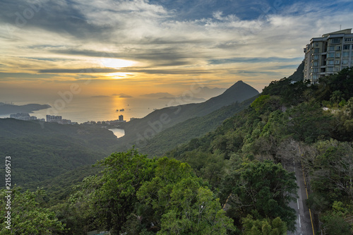 Scenic landscape at sunset from Hong Kong Victoria Peak ,with Lamma Island on the background