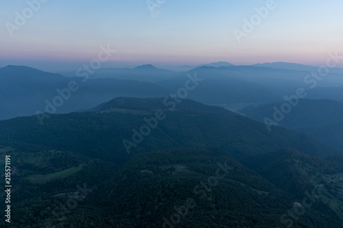 Mountain range panorama, scene tinted in blue due to evening time at Catalonia, Spain © josemaria