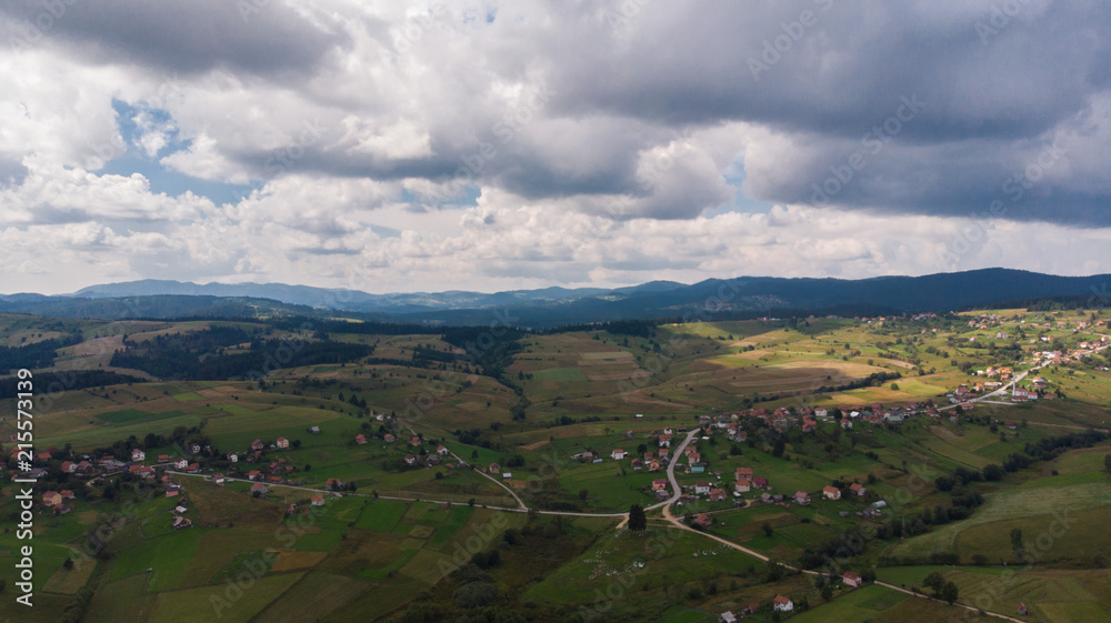 small village and cloudy day from air shoot 