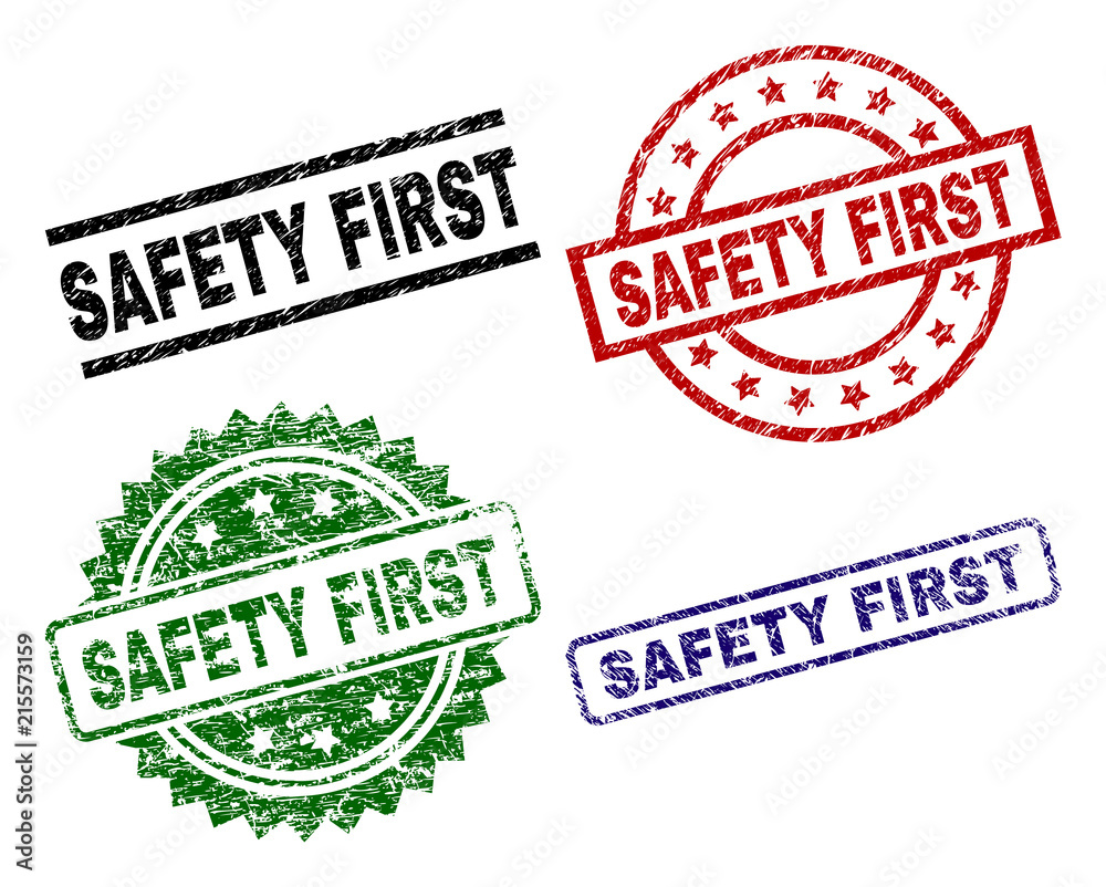 SAFETY FIRST seal prints with corroded surface. Black, green,red,blue vector rubber prints of SAFETY FIRST title with corroded surface. Rubber seals with round, rectangle, rosette shapes. SAFETY FIRST seal prints with corroded surface. Black, green,red,blue vector rubber prints of SAFETY FIRST title with corroded surface. Rubber seals with round, rectangle, rosette shapes.