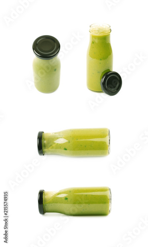 Green sauce in a bottle isolated