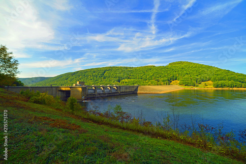 Tablou pe pânză Water reservoir under intense blue sky