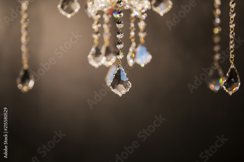 Luxury vintage crystal lamp details. Crystal glass glittering chandelier, cross processed colors