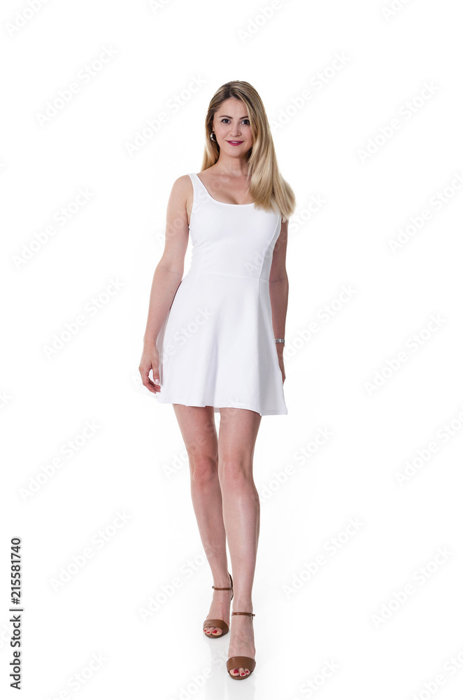 Woman dressed in white mini dress Woman dressed in white mini dress