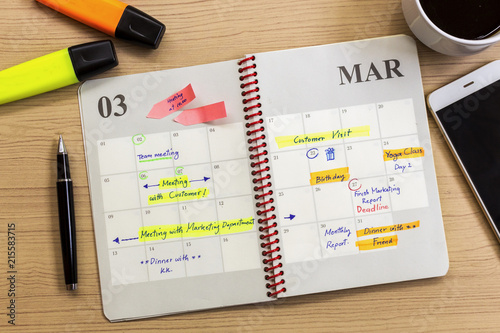 Schedule activity and appointment monthly on office desk. Calendar activity reminder concept. 
