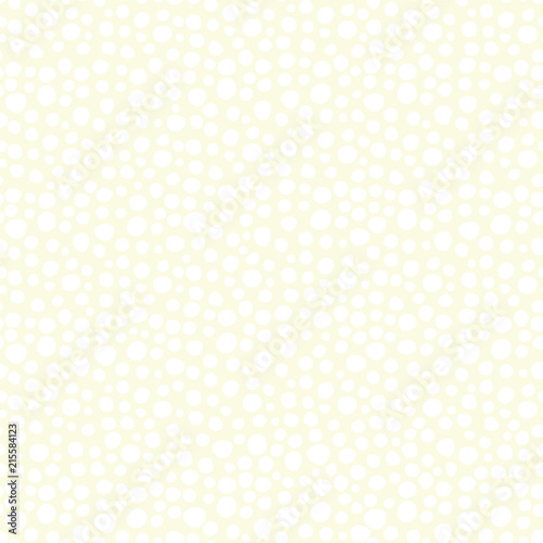 Snowflakes on a beige background seamless vector pattern. White irregular shaped dots. Scattered dots pattern. Perfect as background for Christmas. christmas packaging, cards, gift wrap.