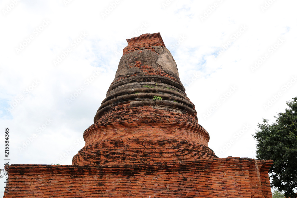 Small stupa beside the main pagoda in the ruins of ancient remains at Wat Worachet temple, it built in 1593 AD in the Ayutthaya period.