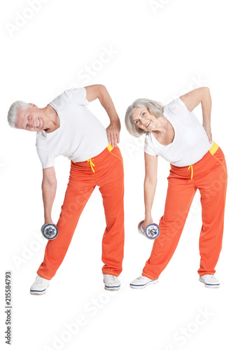 smiling senior couple exercising